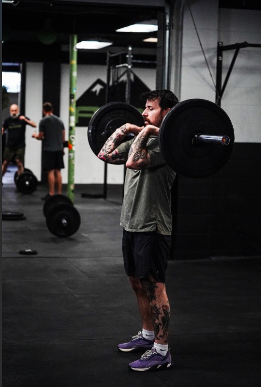 Alpine CrossFit members training during a coached class